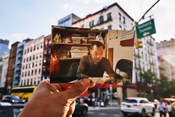 Mr. Lin shown at a friend's home in the Bowery on the day in 2019 when he learned that, with Mr. Chin's help, he had been granted a visa.